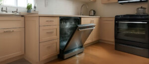 Dishwasher with door slightly opened illustrating Dishwasher Door Unlocking During A Cycle issue.