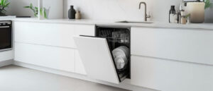 Integrated dishwasher seamlessly blending with kitchen cabinetry, showcasing What is an Integrated Dishwasher.