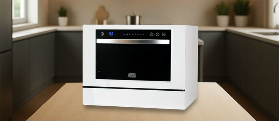 Feature image of BLACK & DECKER BCD6W Dishwasher Review: The image features a countertop (mini / compact) dishwasher placed on a kitchen counter, highlighting its sleek design and modern finish that fits well in small kitchens or apartments.