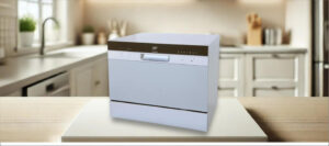 In this SPT SD-2224DS Dishwasher Review image, the countertop dishwasher is showcased on a kitchen counter, emphasizing its compact, space-saving design for modern kitchens.