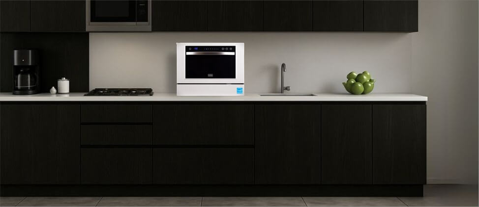 An informative graphic comparing the BLACK + DECKER BCD6W dishwasher's size to common kitchen counters and human height references. This visual aid provides a clear sense of scale, highlighting its compact footprint and suitability for tight kitchen spaces.