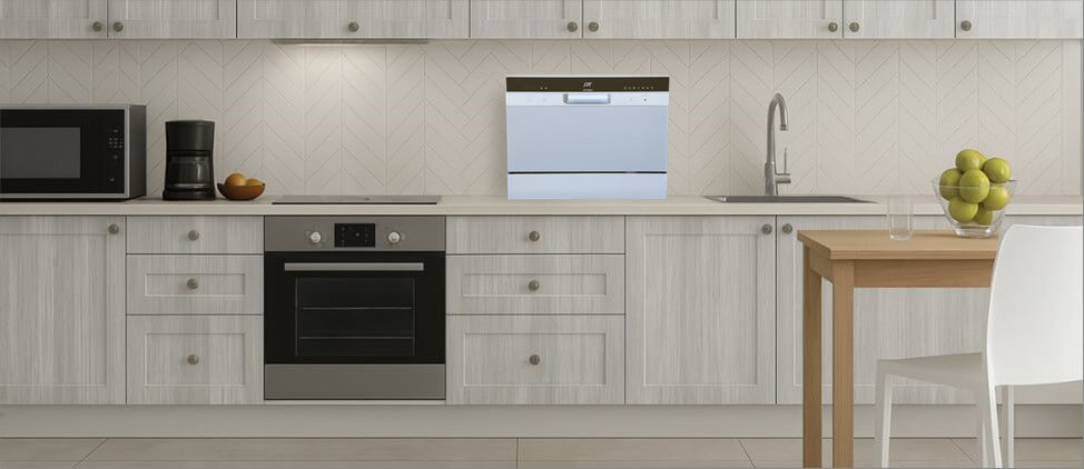 A visual size comparison chart displaying theSPT SD-2224DSB dishwasher alongside a standard kitchen counter and average human heights. The graphic helps users understand its compact dimensions and how it fits within a regular kitchen environment.