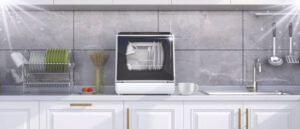 A countertop dishwasher on a kitchen counter next to a sink is a convenient dishwashing solution. This image of article is representing the 8 best countertop dishwashers for elderly.