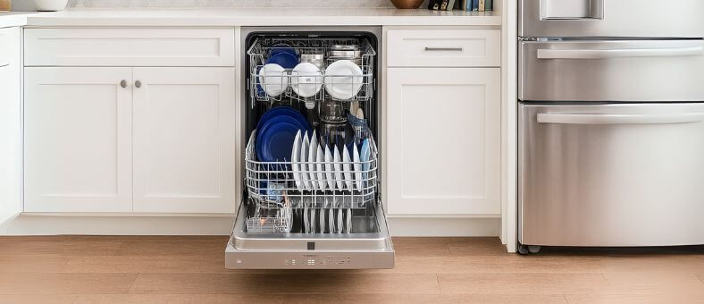 A full load of clean dishes and utensils in dishwasher racks, highlighting the organization and capacity of modern dishwasher racks.