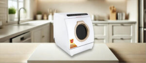 In this Xuthusman ‎1-260FSE65RE Dishwasher Review image, the countertop (compact / benchtop) dishwasher is displayed on a counter in a kitchen, showcasing its stylish appearance and practical placement for everyday use.