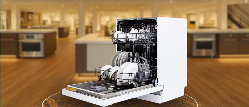 Image showing the Avanti DWF24V0W built-in (under-counter) dishwasher is placed in a showroom, emphasizing its streamlined front panel and modern aesthetic.