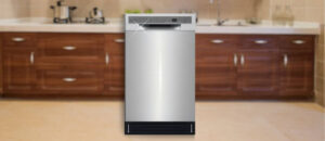 Frigidaire FFBD1831US Dishwasher Review – stainless steel built-in dishwasher displayed in a modern kitchen setting with wooden cabinets.