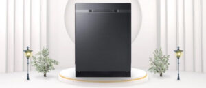 A featured image of the topic Samsung DW80R5060UG Dishwasher Review. A Samsung DW80R5060UG dishwasher is showcased on a pedestal with a glowing halo at the base, flanked by ornamental plants and other things, set against a backdrop of elegant white curtains.