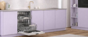 Get Rid of Ants in Your Dishwasher with a clean, empty built-in dishwasher shown open in a light purple themed modern kitchen, featuring spotless cabinets, a bright countertop, and a neat, hygienic environment.