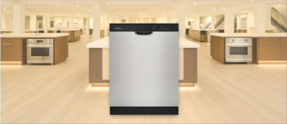 In this Amana ADB1400AMS Dishwasher image, the built-in (under-counter) dishwasher is displayed in a showroom setting, highlighting its modern design and front panel.