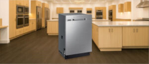 Feature image of SAMSUNG DW80N3030US Dishwasher Review: The image shows the built-in (under-counter) dishwasher is placed in an appliance showroom, displaying the dishwasher’s refined and modern look, with a streamlined front panel and stylish build that complements today’s kitchens.