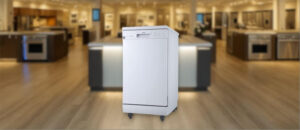 Danby DDW1805EWP Dishwasher Review image showing the freestanding (portable) dishwasher is placed in a showroom, emphasizing its streamlined front panel and modern aesthetic.