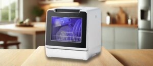 EUHOMY DW02 Dishwasher Review: A modern EUHOMY DW02 countertop dishwasher with a transparent viewing window, placed on a wooden countertop in a well-lit kitchen. The interior is illuminated with blue lighting, revealing plates, glasses, and cups neatly arranged inside, demonstrating its compact yet spacious design.