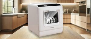 ICUIRE TDQR05 Dishwasher in a Modern Kitchen – A sleek ICUIRE TDQR05 countertop dishwasher placed in a modern kitchen setting, featuring a compact design, digital display, and transparent viewing window with neatly stacked dishes inside. Featured image of the article "ICUIRE ‎TDQR05 dishwasher review"