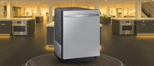 Feature image of SAMSUNG DW80B6061US Dishwasher Review: The image shows the dishwasher is placed in an appliance showroom displaying the dishwasher’s refined and modern look, with a streamlined front panel and stylish build that complements today’s kitchens.