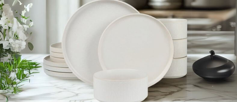 Famiware 12-piece stoneware dinnerware set with ribbed edges and clean white finish, perfectly suited for dishwasher use and modern decor.