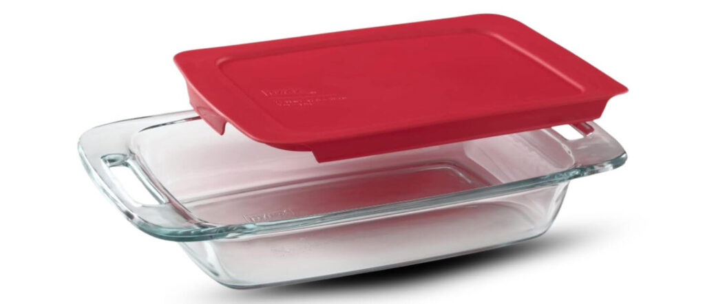 Pyrex Easy Grab dishwasher-safe glass food container with red plastic lid, perfect for baking and storing leftovers.