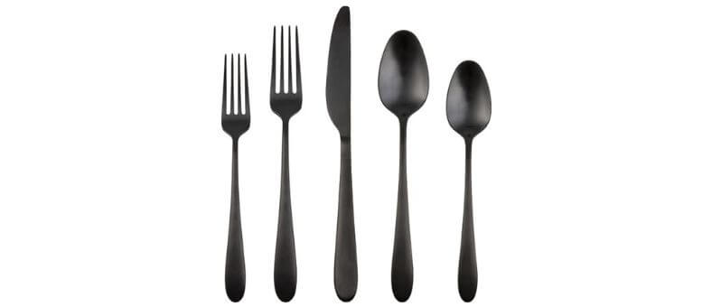 Cambridge Silversmiths Poet flatware set in matte black, featuring five elegant utensils with a smooth, modern design against a white background.