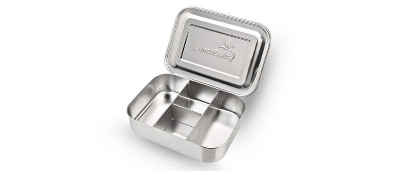 A stainless steel lunchbox with three compartments and a matching steel lid, opened to show interior sections.