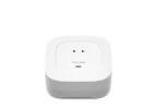 04- YoLink Water Leak Detector Small Compact square-shaped YoLink leak sensor detecting water on a hardwood floor.