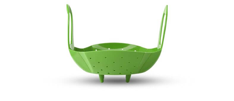 Image displays a bright green silicone steamer basket with high folding handles and short legs for support.