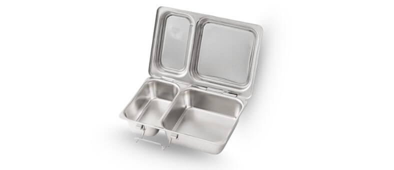 A compact stainless steel lunchbox with two compartments and a hinged lid.