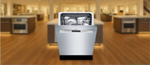 BOSCH SHEM63W55N Dishwasher Review image showing the built-in (under-counter) dishwasher is placed in a showroom, emphasizing its streamlined front panel and modern aesthetic.
