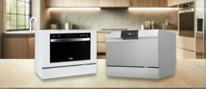 A side-by-side comparison of two popular countertop dishwashers, the Black + Decker BCD6W and the Danby DDW631SDB, placed on a wooden kitchen island with a modern kitchen in the background. The Black + Decker model features a sleek black front panel with touch controls, while the Danby unit has a brushed silver finish and a centered digital display. This image visually highlights design differences for the article comparing Black + Decker vs Danby dishwashers.