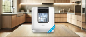 Midea MDC17P2DWW Dishwasher Review image showing the countertop (tabletop / benchtop) dishwasher set up on a kitchen counter, drawing attention to its minimal footprint and user-friendly front panel.