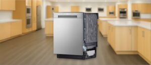 Feature image of LG LDFC2423V Dishwasher Review: The image shows the built-in (under-counter) dishwasher is placed in an appliance showroom, displaying the dishwasher’s refined and modern look, with a streamlined front panel and stylish build that complements today’s kitchens.