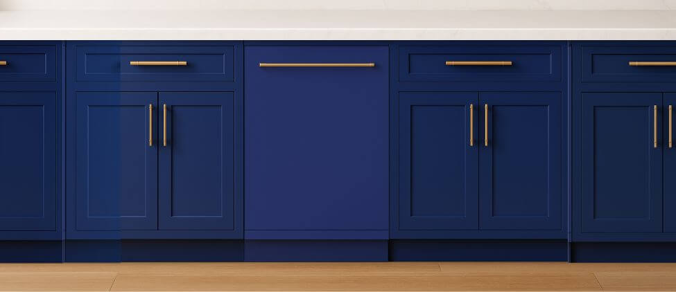 A sleek, contemporary kitchen with built-in cabinetry, integrated appliances, and a modern sink setup. The KoolMore KM-DW1852 dishwasher is seamlessly installed within the cabinetry, demonstrating its compatibility with clean, minimalist kitchen designs.