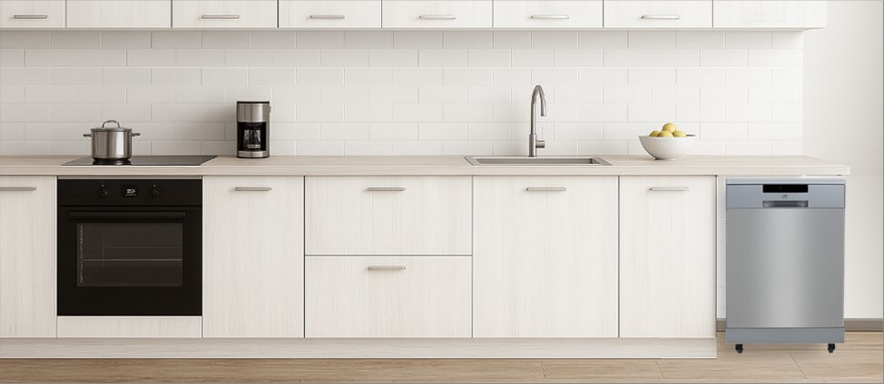 A sleek, modern kitchen featuring minimalistic cabinetry and polished surfaces. Positioned neatly in the corner, the freestanding SPT SD-6513SSAdishwasher blends convenience with flexibility, showing how well it fits into a functional yet dynamic kitchen space.