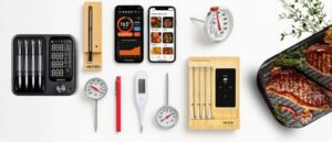 Best Meat Thermometers – a stylish flat lay of digital, wireless, and dial meat thermometers displayed on a white surface alongside grilled steaks, showcasing tools that ensure perfect temperature control and hassle-free cooking.