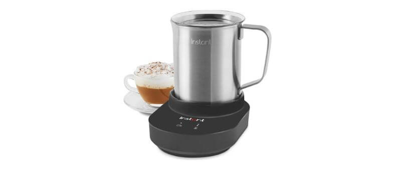 Instant Magic milk frother and steamer with stainless steel jug on black control base.