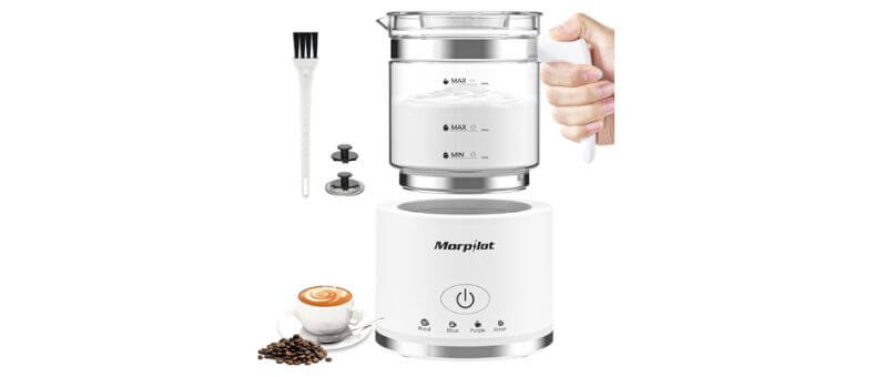 Transparent electric milk frother and steamer with detachable glass jug, white base, and accessories.
