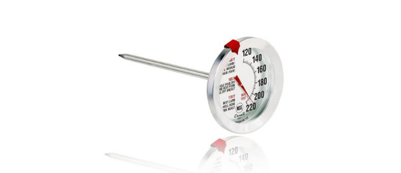 A classic analog meat thermometer with a round dial and stainless steel probe for accurate temperature reading.