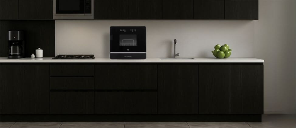 A size comparison graphic illustrating the BLITZHOME BH-6-CDW1 dishwasher's dimensions in relation to a kitchen counter and standard human heights. The diagram provides a visual reference for users to gauge its compact form factor and placement in a typical kitchen setup.