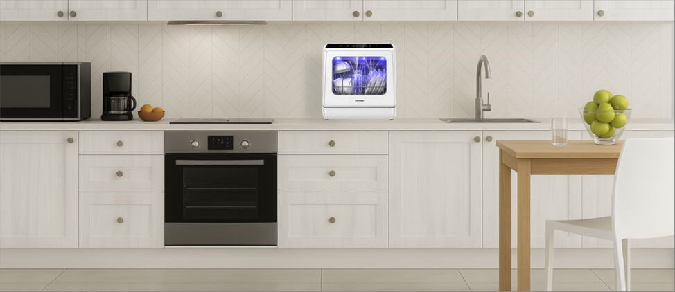 A size comparison graphic illustrating the FOHERE TDQR01 dishwasher's dimensions in relation to a kitchen counter and standard human heights. The diagram provides a visual reference for users to gauge its compact form factor and placement in a typical kitchen setup.